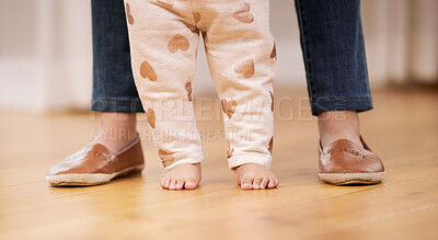 Buy stock photo Feet, baby and mom walking with child for development, motor skills and support in family home. Woman, kid and learning together with connection, love and trust and parent with legs in apartment