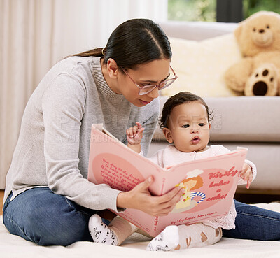 Buy stock photo Mother, baby and reading book for learning in home, bonding and care, love or relax. Mom, newborn child and storytelling for education, teaching or studying fantasy fairytale together in living room