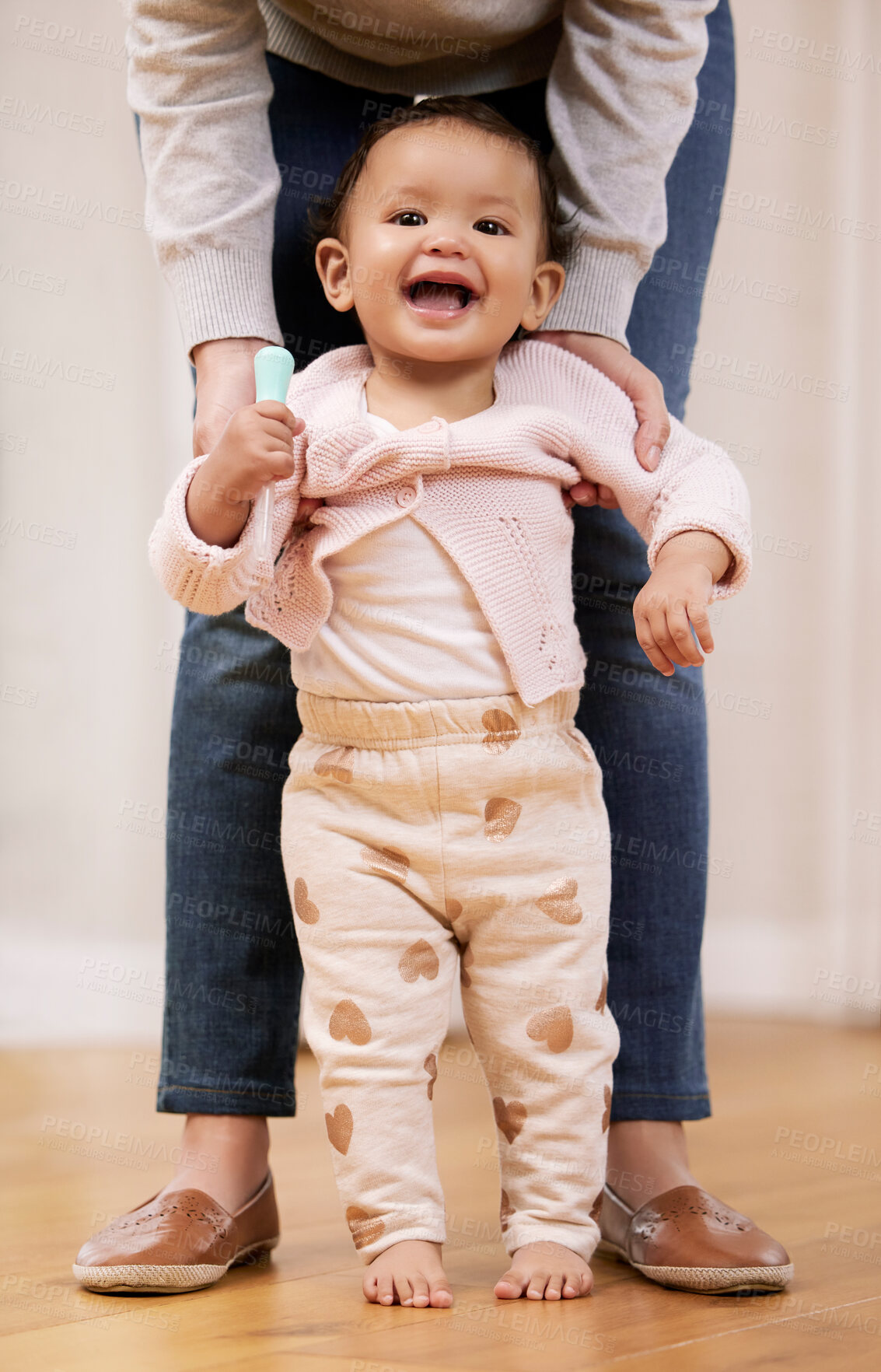 Buy stock photo Walking, portrait or hands of mom with baby in home for care, love or smile together to nurture child development. Happy, family and single parent mother with girl or female kid for support and trust