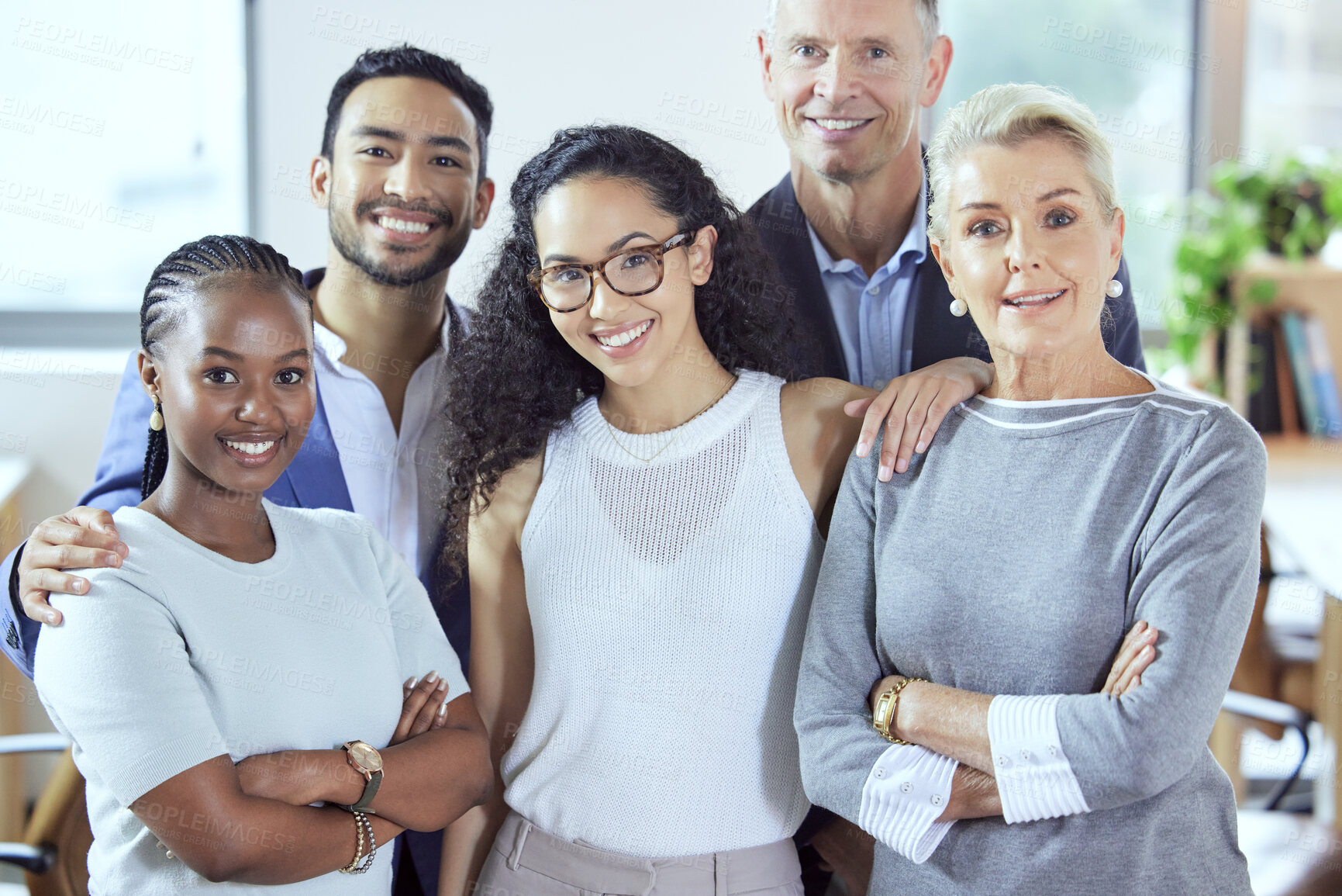 Buy stock photo Shot of a group of businesspeople standing in an office at work