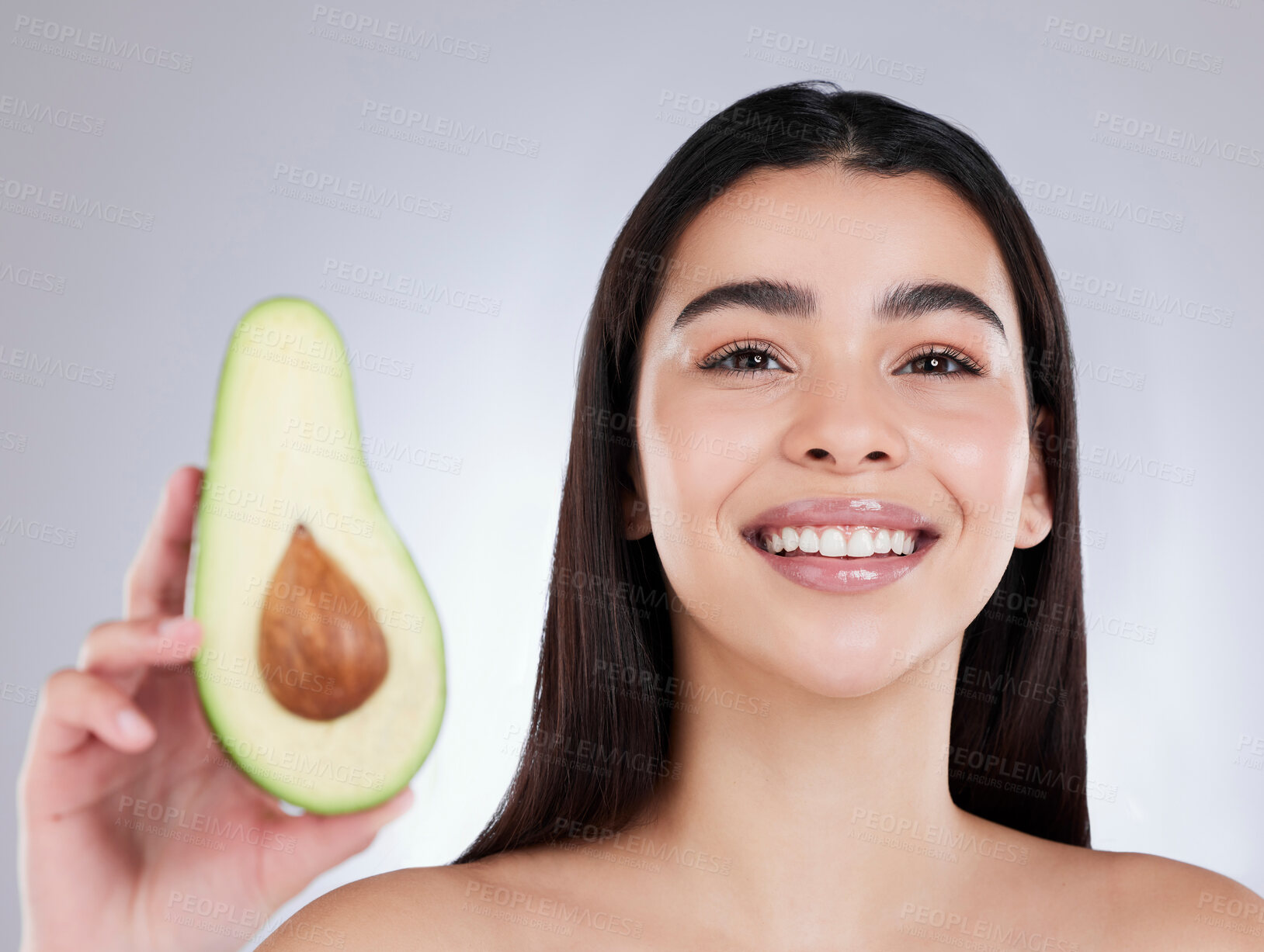 Buy stock photo Portrait, avocado and beauty or skincare for woman in studio, nutrition and wellness on white background. Detox, benefits and vitamin C from fruit, shine and glow for body or organic salon treatment 