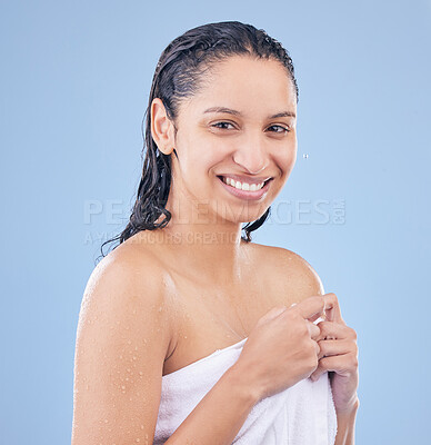 Buy stock photo Shot of a woman holding a towel around her after washing