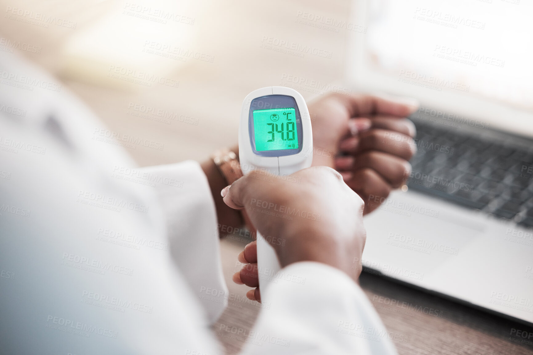 Buy stock photo Woman, hands and scan with infrared thermometer for temperature, fever or symptoms at office. Closeup of female person checking health, exam or test on wrist in disease, illness or covid at workplace