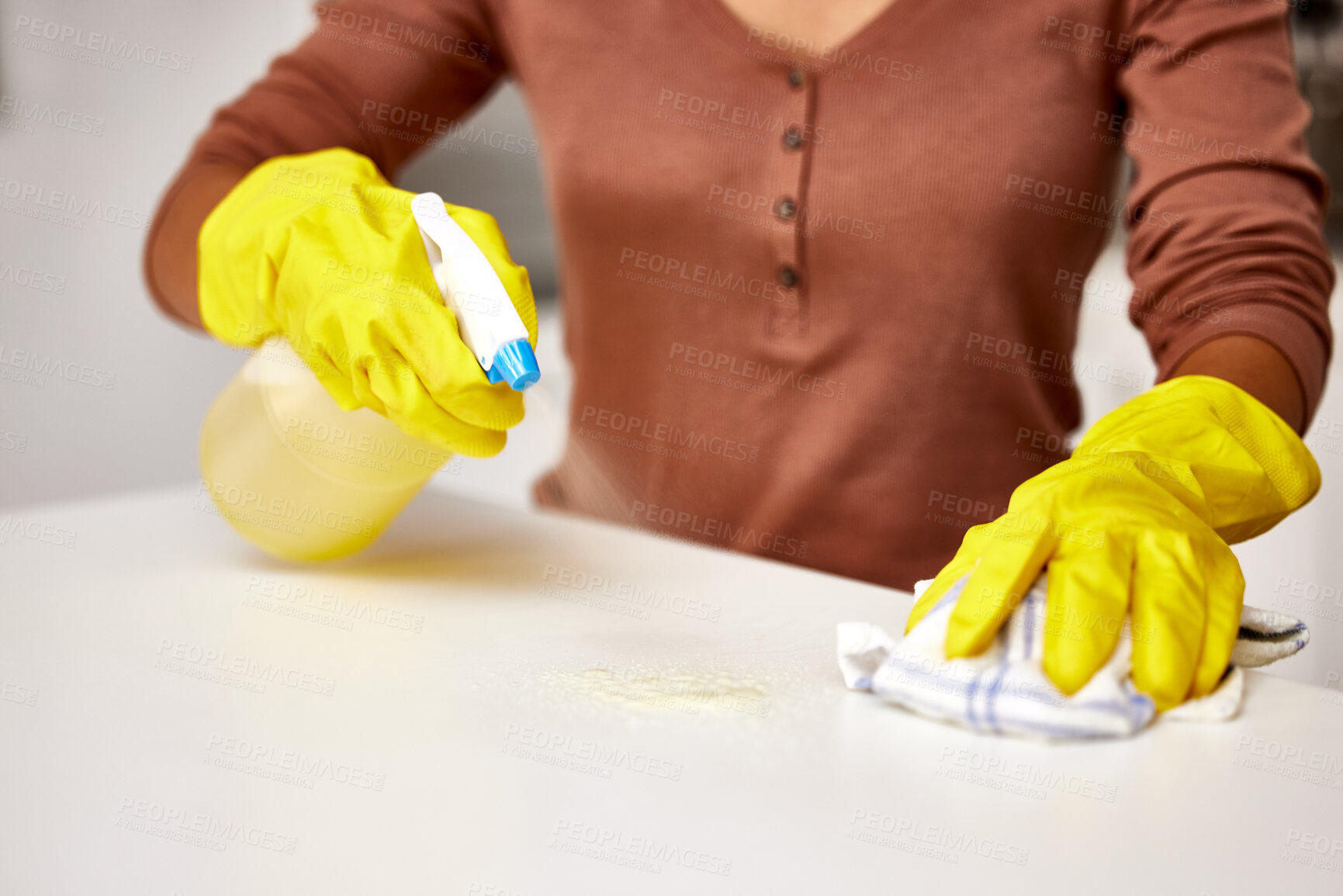 Buy stock photo Hands of person, spray bottle and cleaning kitchen for dirt, germs or bacteria with product. Housekeeping service, female cleaner or gloves for protection from chemical, hygiene or sanitize counter
