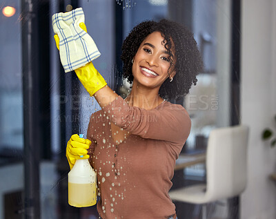 Buy stock photo Black woman, portrait and cleaning windows in home, wipe glass and spray chemicals for hygiene. Female person, maid and maintenance service in apartment, soap and disinfect detergent for housekeeping