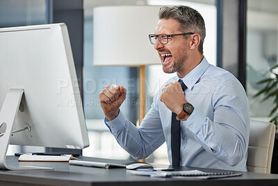 Buy stock photo Happy, businessman and fist in celebration for promotion, winning or success by desk at the office. Man employee in joy for win, achievement or bonus on computer in sale, target or prize at workplace