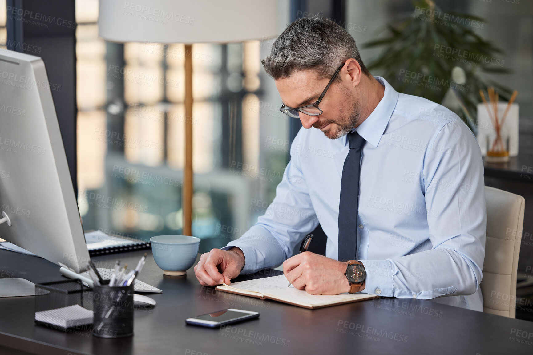 Buy stock photo Business, writing and man with notebook, planning and ideas for schedule, project and startup. Person at desk, compliance officer and employee with professional, corporate and career ambition