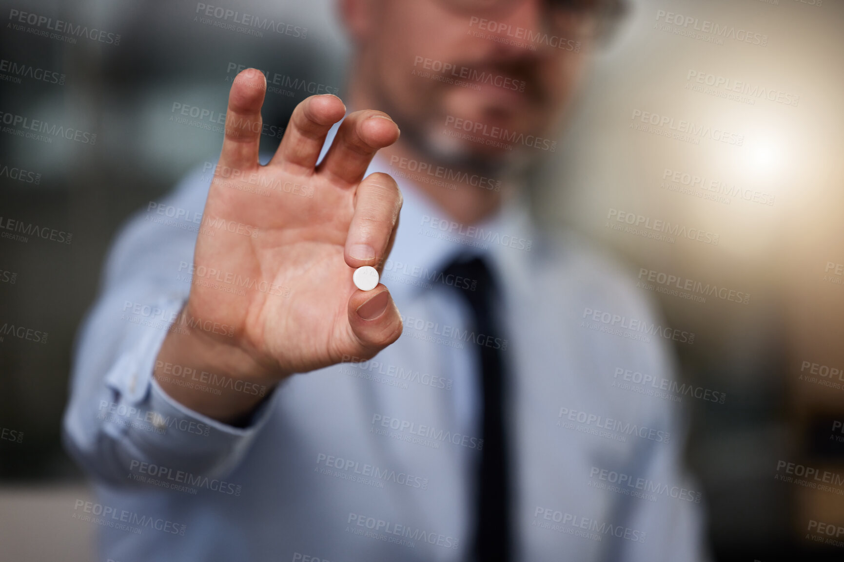 Buy stock photo Business, man and pill in hand in office for headache or stress relief, vitamins and supplements for energy. Person, pain killer and anxiety medication or booster for productivity or focus at work.
