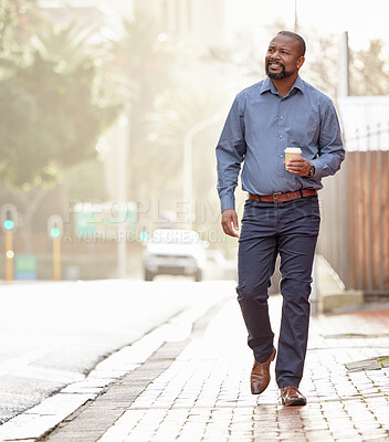 Buy stock photo Mature businessman, drink and walking by city with lens flare, bokeh and urban background. Black male person, coffee and fresh air by cbd road for work break with smile and sunshine in South Africa