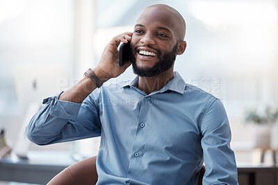 Buy stock photo Cropped shot of a handsome young businessman making a call while sitting in his office