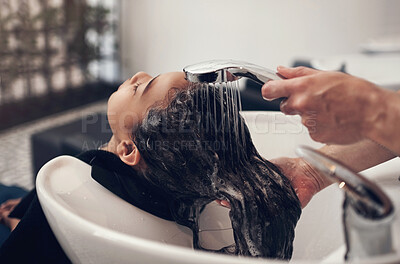 Buy stock photo Water, girl child and hairdresser with hair care in salon for shampoo, treatment or conditioner. Washing, beauty and client with hands of stylist for cleaning, luxury massage or service by basin