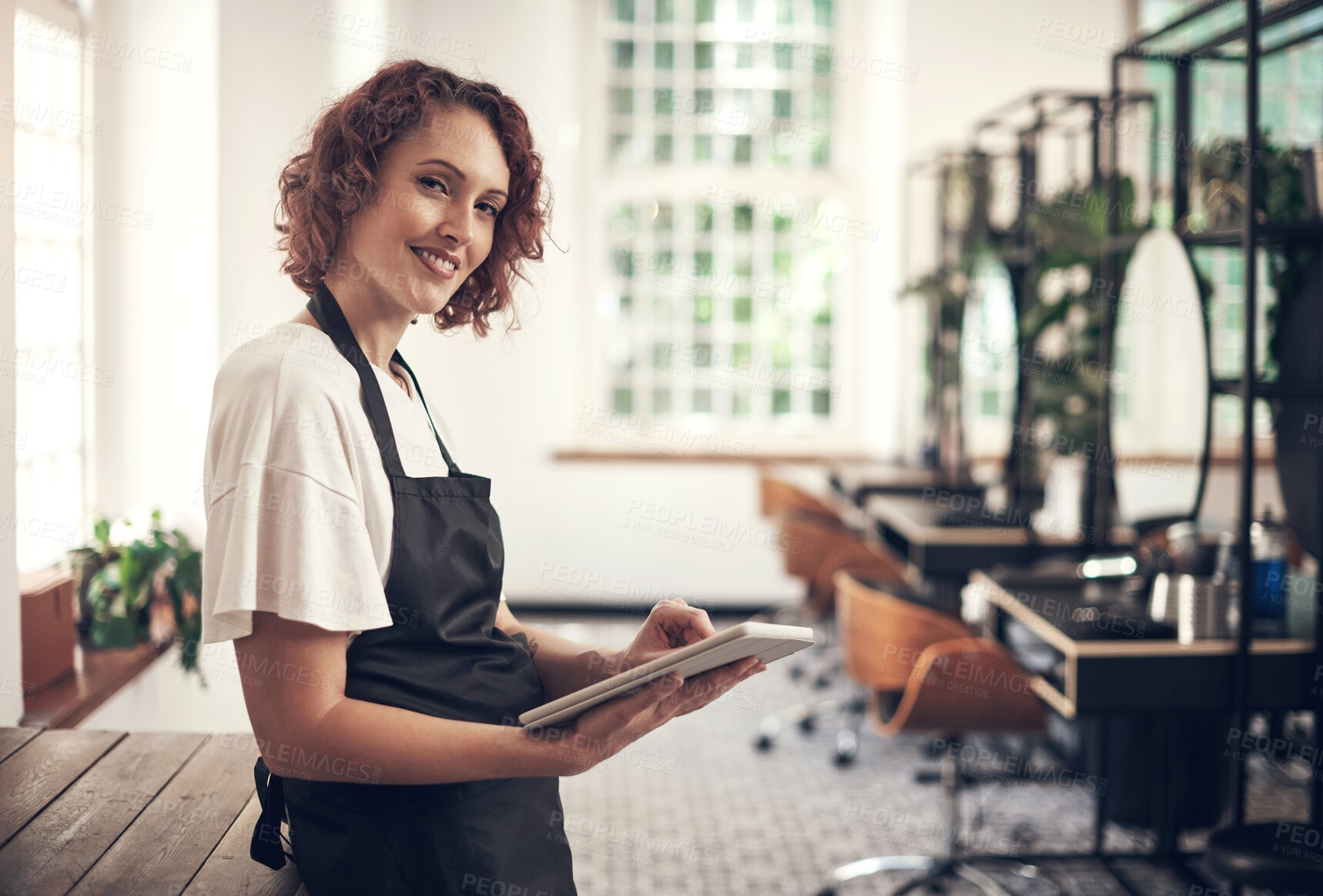 Buy stock photo Smile, portrait and woman with tablet at hair salon for appointment, information and client records. Small business, stylist and person with tech at spa for online, schedule or beauty tips on website