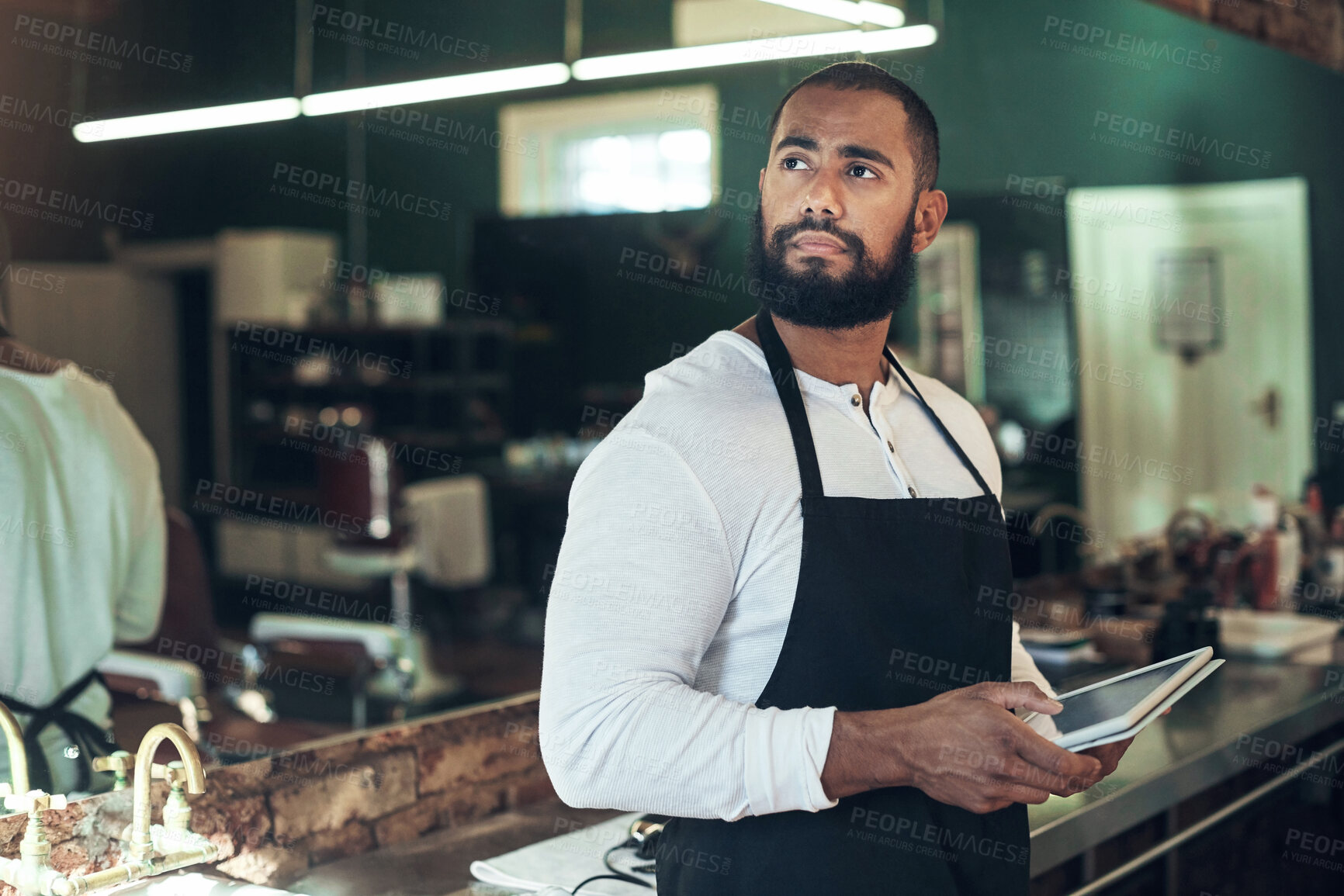 Buy stock photo Barber, thinking and man with tablet at work for client, booking and appointment information. Small business, stylist and person with tech in salon for online, portfolio and haircut tips on website