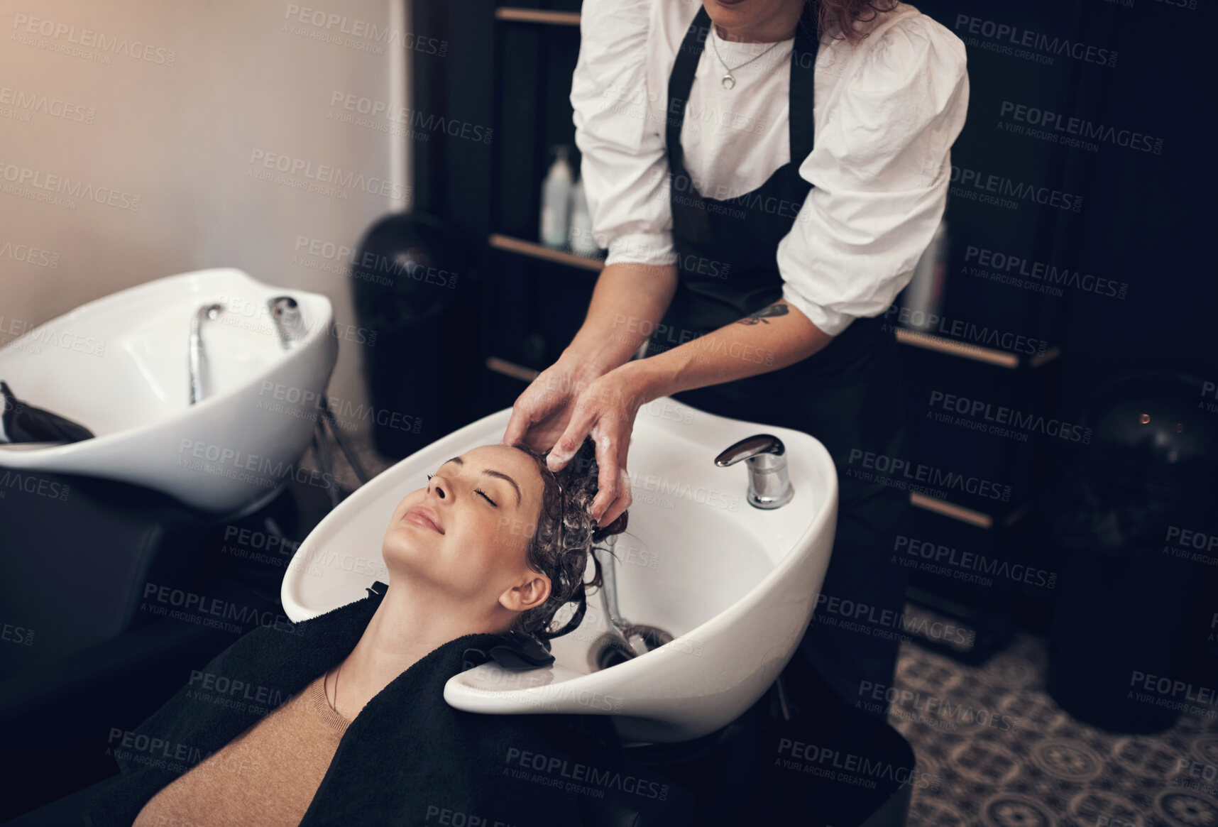 Buy stock photo Hairdresser, soap and water for client hair, salon and treatment with tap and basin for washing. Hands, clean scalp and hygiene in hairstyle for happy female person, keratin and shampoo for haircare