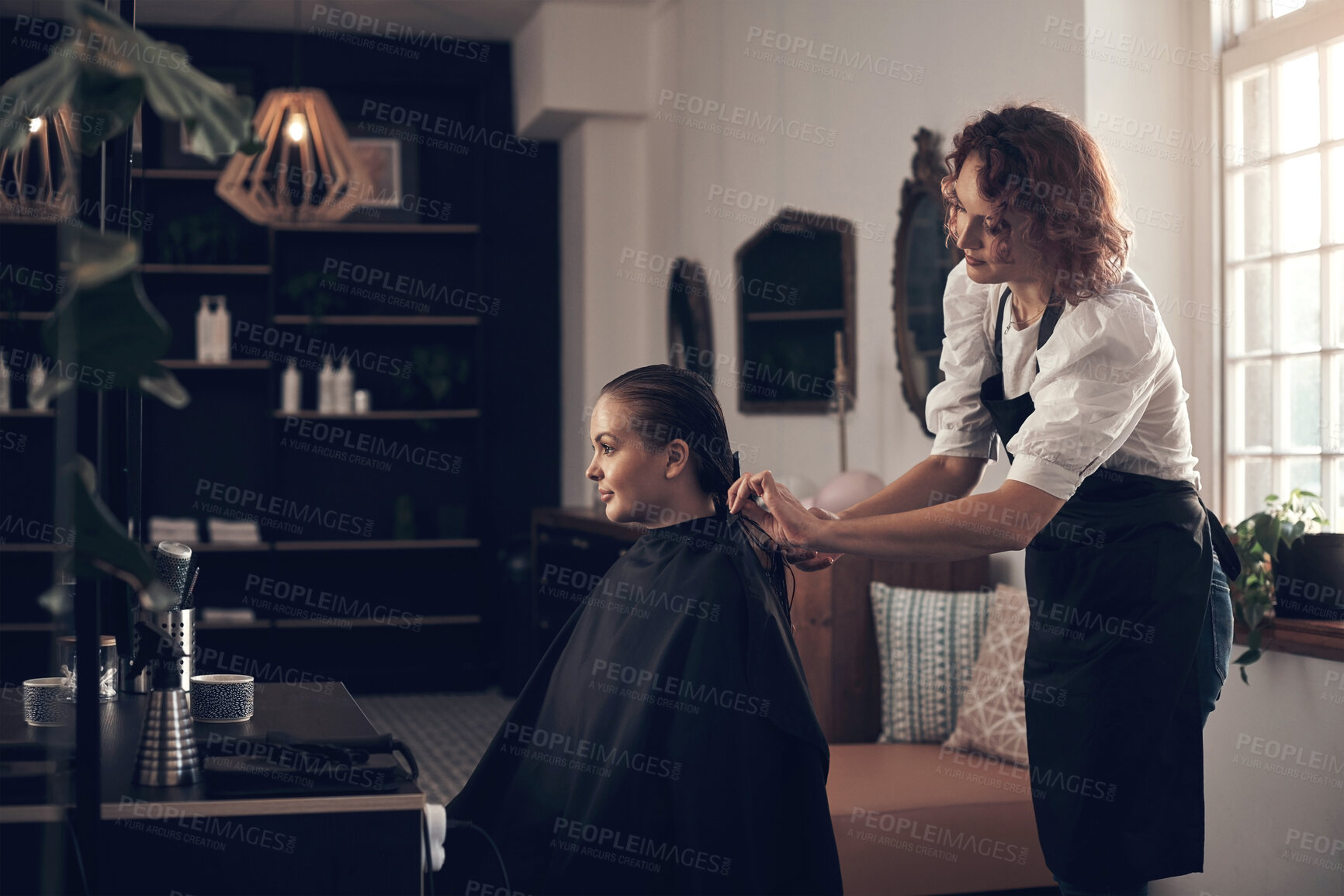Buy stock photo Woman, hairdresser and cut hair of customer for keratin treatment, haircare and professional cut for hairstyle. Beauty salon, cosmetologist and hairstylist with client for grooming, service and care.