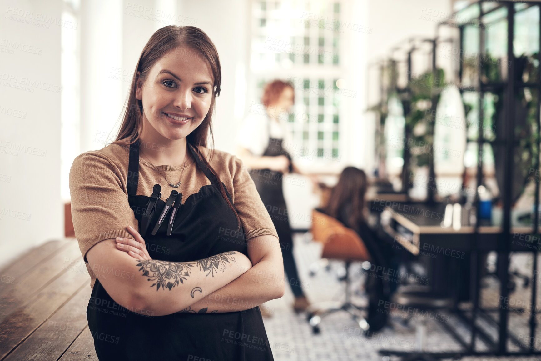 Buy stock photo Portrait, woman and hairdresser in apron, arms crossed and small business for haircare, employee and smile. Startup, service and person with tools for working, entrepreneur and pride for barber shop