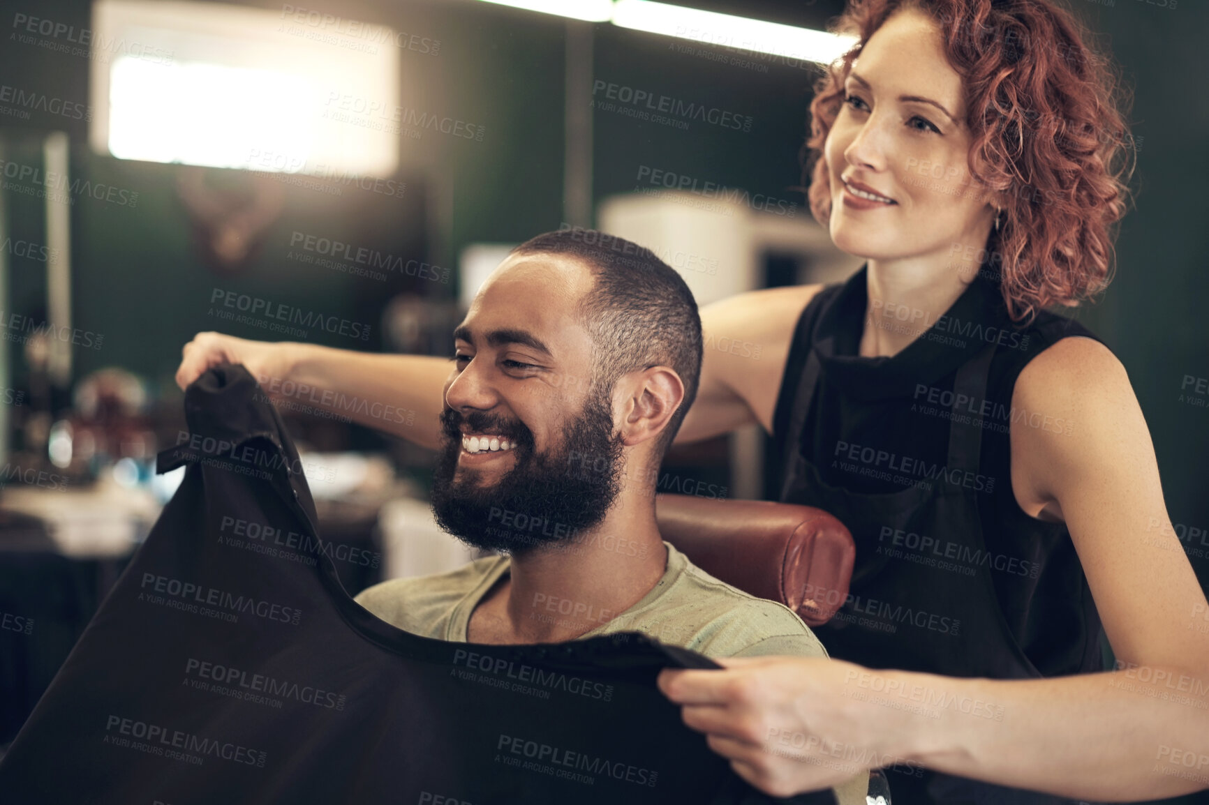 Buy stock photo Barber, salon and hairdresser with man in chair for grooming, beard service and trim in boutique. Hair care, barbershop and beautician with happy customer for appointment, treatment and hairstyle