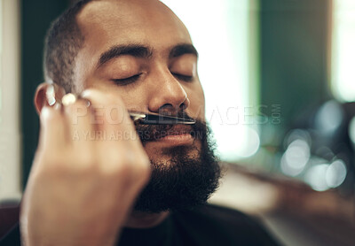 Buy stock photo Moustache, trim and man at barbershop with scissors, haircut and relax in customer service at small business. Tools, barber and client in chair for beard grooming, style and facial hair care makeover