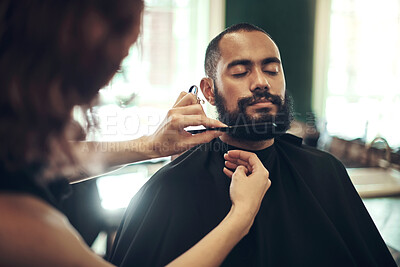 Buy stock photo Barber, scissor and hairdresser with man for beard service, facial grooming and trim in boutique. Hair salon, barbershop and beautician with tools for customer for appointment, treatment or hairstyle