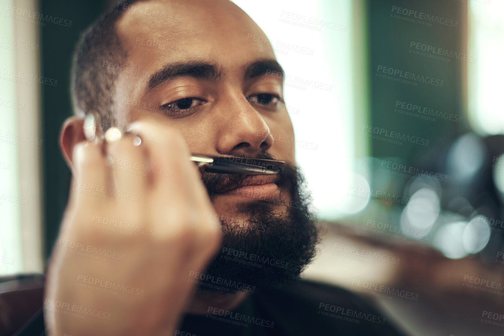 Buy stock photo Beard, moustache and man at barbershop with scissors, haircut trim and relax in customer service at small business. Tools, barber and face of client in chair for grooming, style and facial hair care