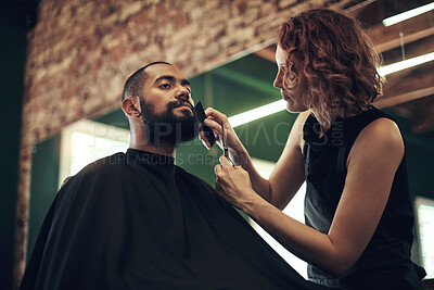 Buy stock photo Beard, woman and man at barbershop for trim with comb, scissors and haircut with customer service at small business. Tools, barber and client in chair for grooming, style or facial hair care at salon