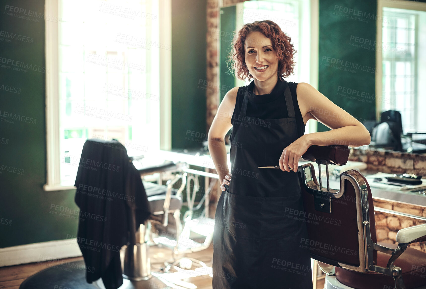 Buy stock photo Salon, confidence and portrait of happy woman in barbershop for stylist, hairdresser or small business owner. Smile, about us and female barber in service with tools, pride and professional hair care