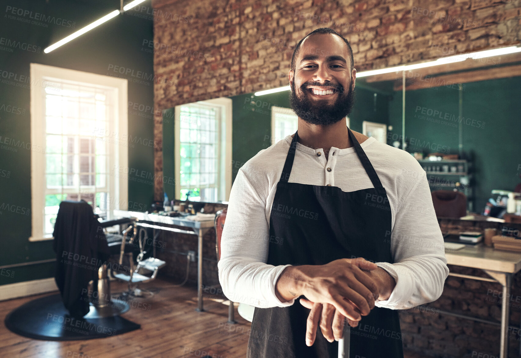 Buy stock photo Happy, confidence and portrait of man in barbershop with stylist, entrepreneur and small business owner. Smile, about us and barber in salon with tools, pride and professional hair care service