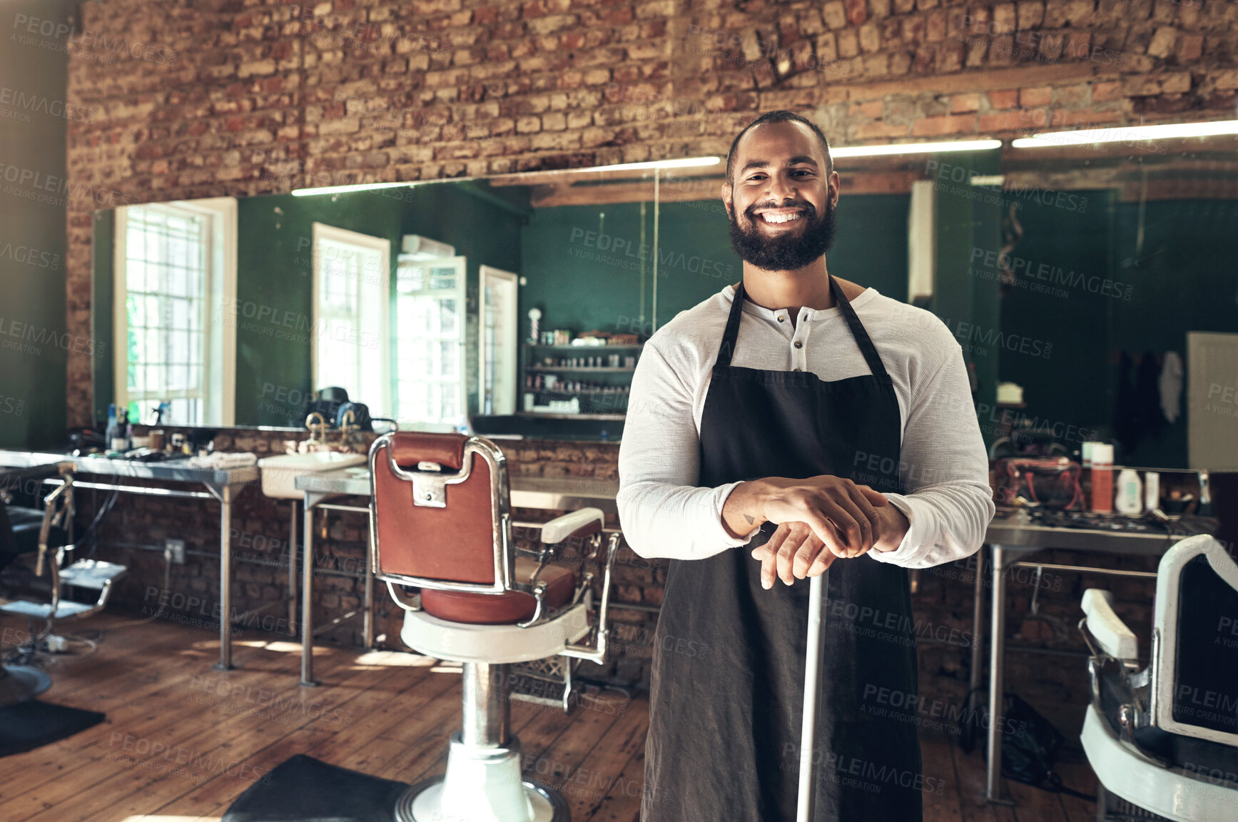 Buy stock photo Hair care, confidence and portrait of man in barbershop with stylist, entrepreneur and small business owner. Smile, about us and happy barber in salon with tools, pride and professional in service