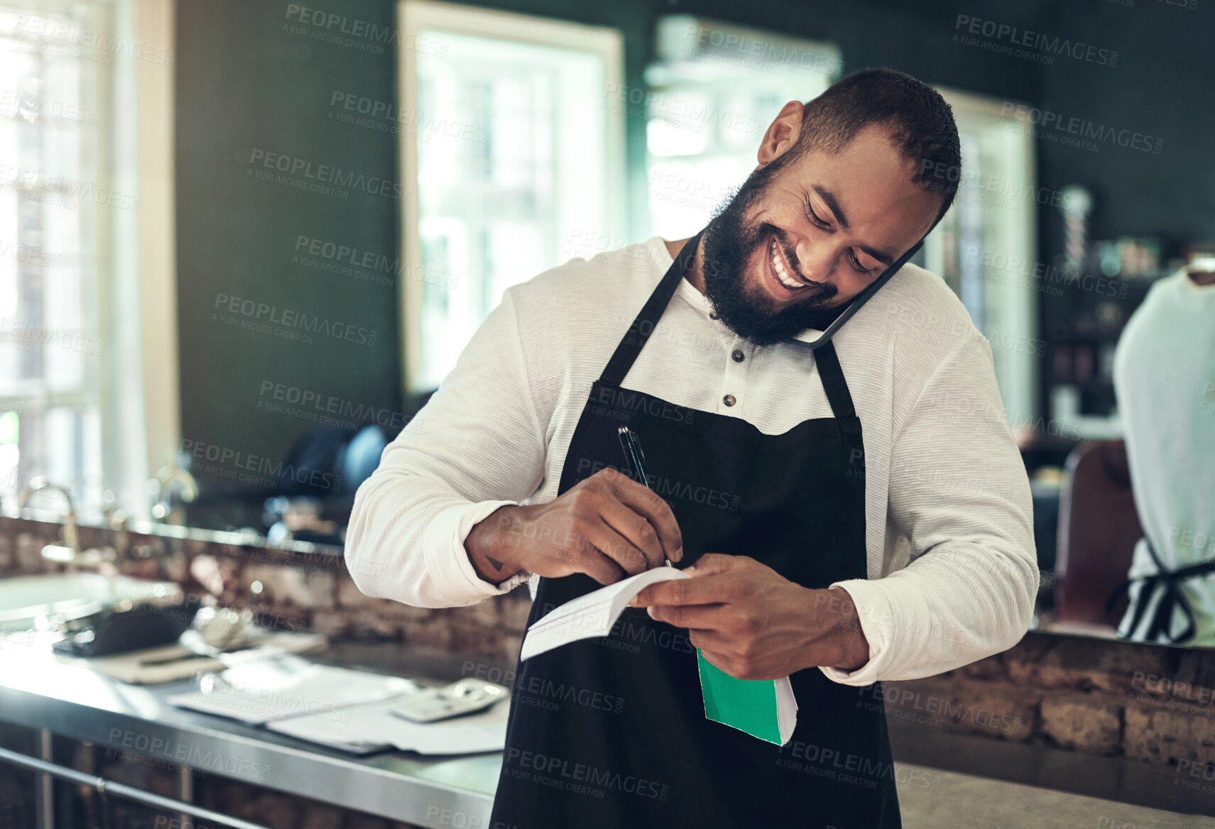 Buy stock photo Business, happy barber and man on phone call to schedule appointment, booking reminder and writing invoice. Startup salon, entrepreneur or smile with mobile chat for customer service or communication