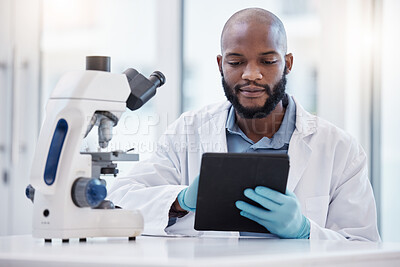 Buy stock photo Black man, scientist and tablet in laboratory for research, innovation or healthcare with gloves for hygiene. Male person, studying or planning in lab for medical diagnosis, test or experiment