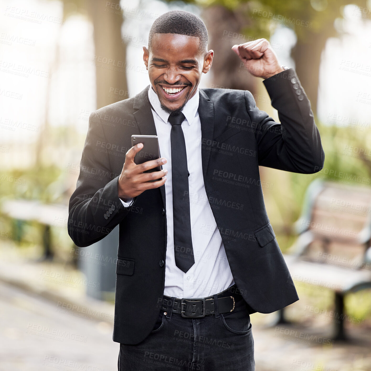 Buy stock photo Business, celebration and black man with phone outdoor at park for goal, success or winning prize. Mobile, yes and cheers of excited professional salesman reading good news, bonus or career promotion