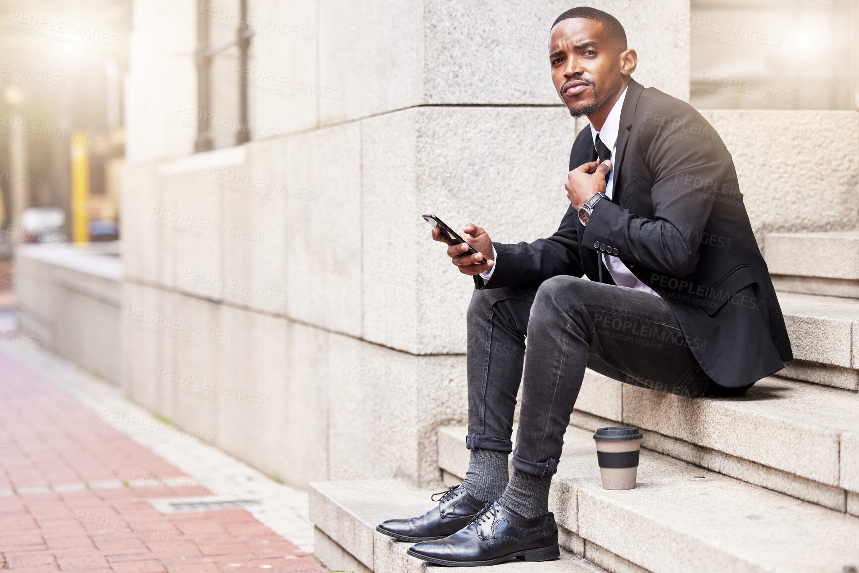 Buy stock photo Portrait, phone and business man in city on steps for coffee break, social media or consultant typing outdoor in Kenya. Face, mobile or professional entrepreneur in street with suit for career or job