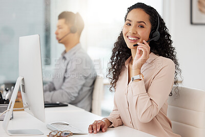 Buy stock photo Portrait of a young call centre agent working on a computer in an office