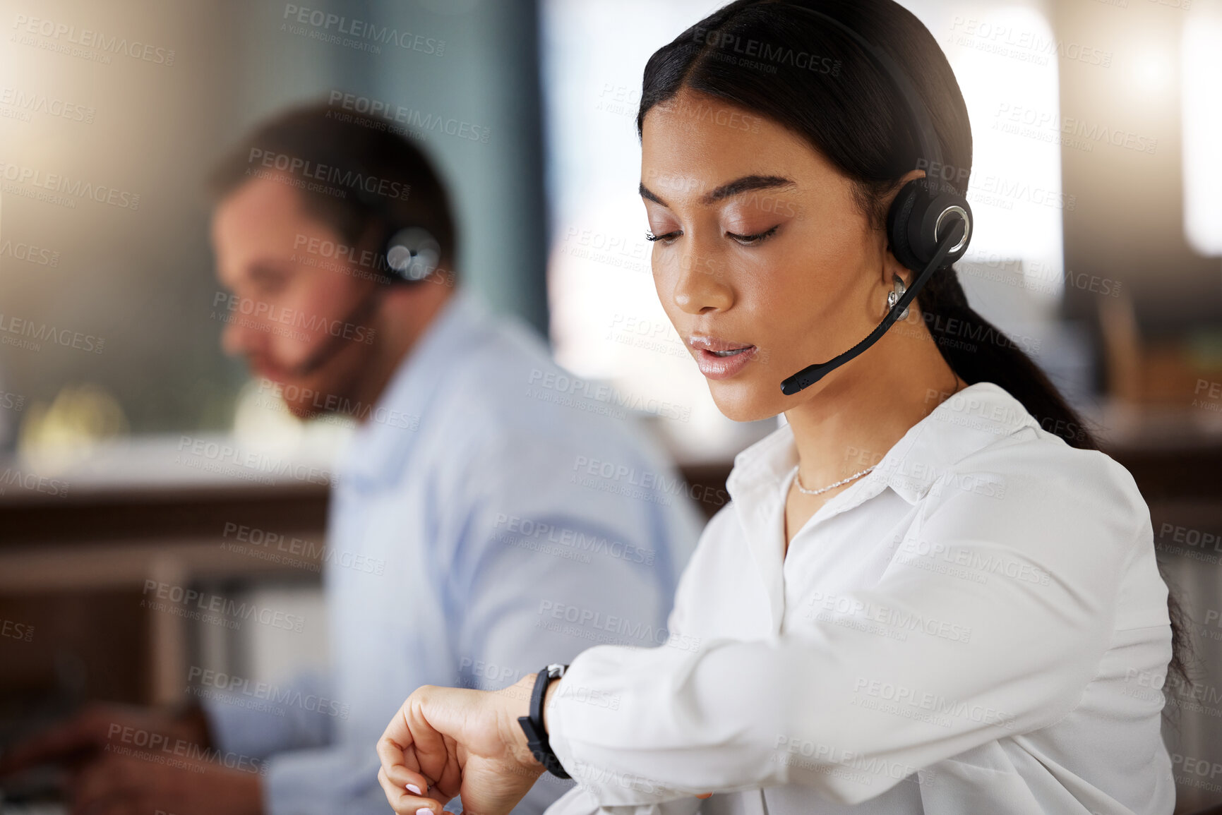 Buy stock photo Headset, woman and office with watch for time management, late appointment and online customer service. Call centre agent, headphones and clock at agency for clients with deadline and overtime work