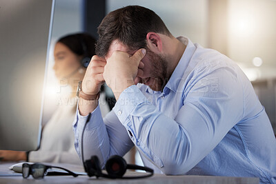 Buy stock photo Man, desk and headset with stress for tired, customer service job and burnout with lens flare. Call centre agent, headphones and frustrated at agency with headache, web 404 and exhausted employee