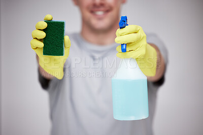 Buy stock photo Hands in gloves, sponge and spray bottle with person in studio on gray background for cleaning. Bacteria, product and safety with cleaner closeup for sanitary chores or housework for responsibility