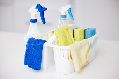 Buy stock photo Cleaning, tools and basket with bottle spray for home disinfection or detergent container for janitor service. Chemical, cleaner or washing supplies with cloth and protection from bacteria or germs
