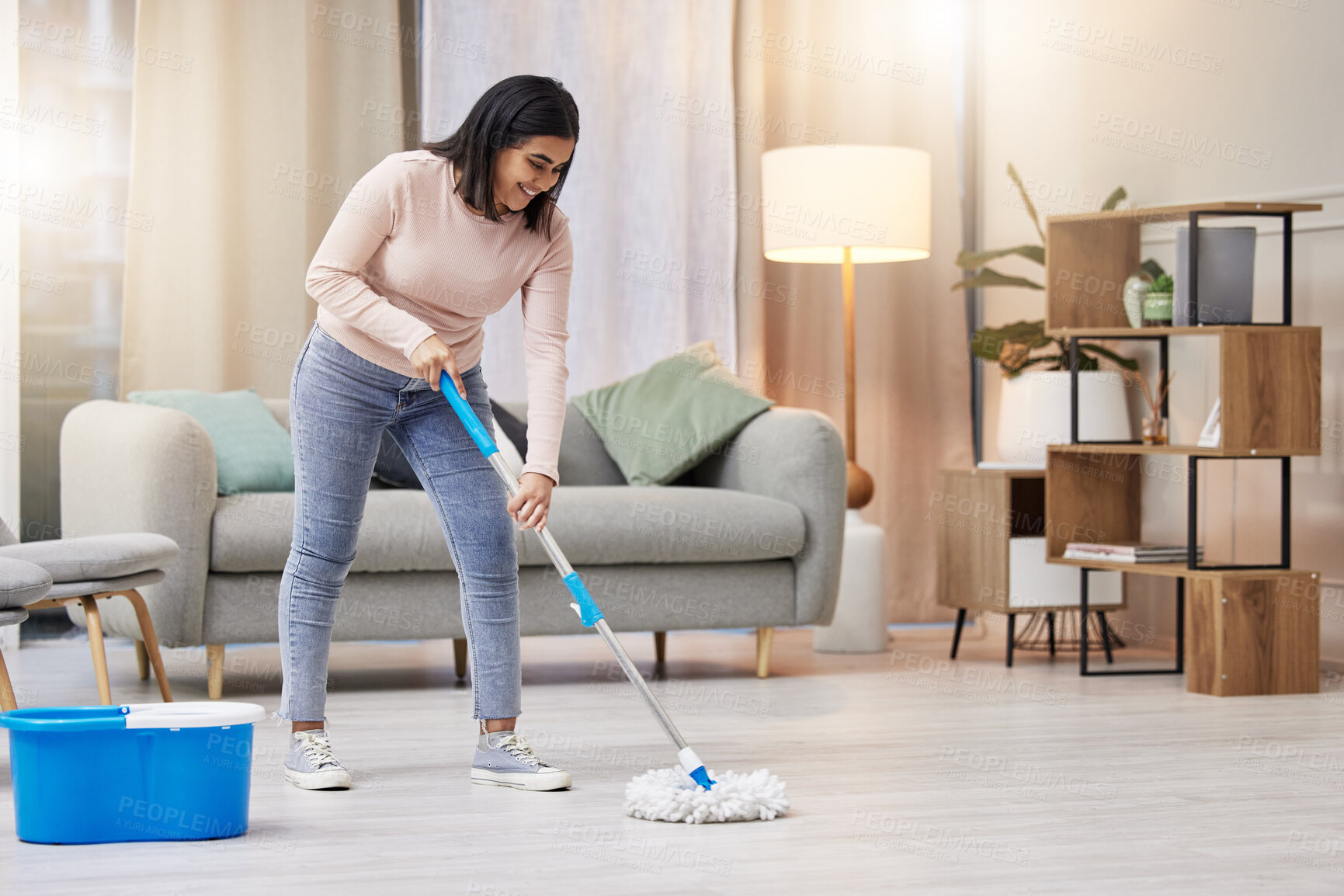 Buy stock photo Happy, woman and cleaning floor in home with mop for hygiene with detergent for safety or protection from germs . Smile, housekeeper or service for health or wellness from virus or bacteria in lounge