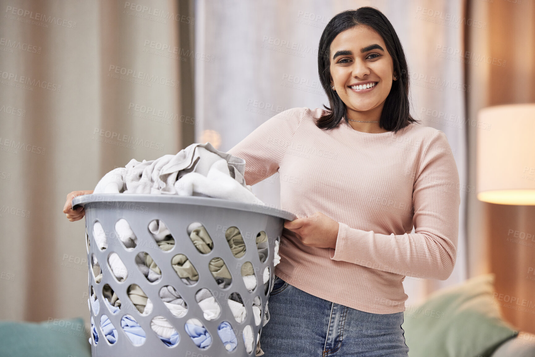 Buy stock photo Laundry, basket and portrait of woman in home and happy spring cleaning, task or activity. Maid, cleaner and girl washing clothes in hotel apartment with hospitality, service and tidy housework