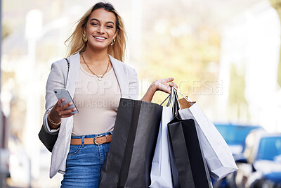 Buy stock photo Outdoor, woman and shopping with bags, portrait and smartphone with luxury products, smile or discount deal. Happy person, consumer or girl with sale, cellphone or fashion in urban town with purchase