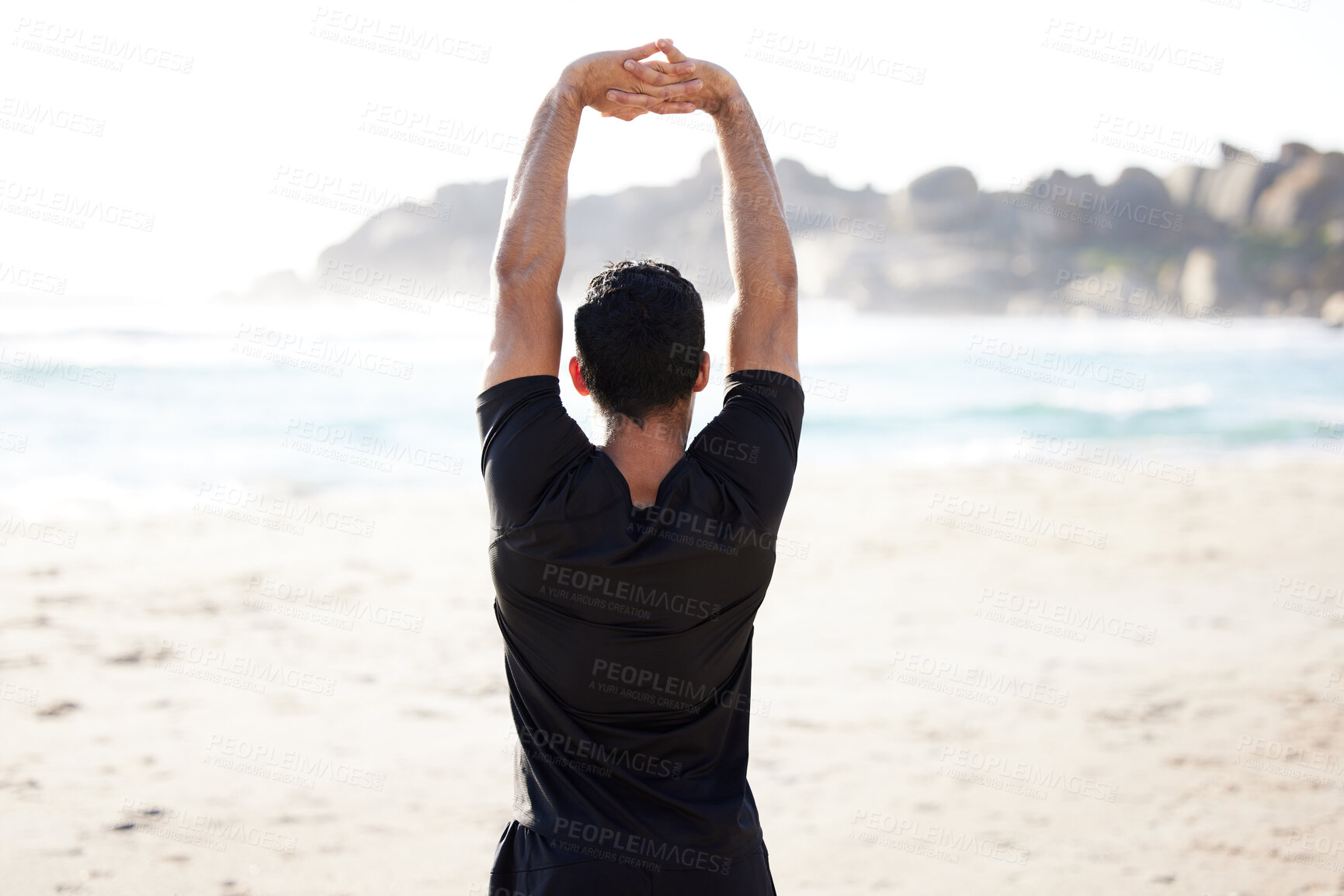 Buy stock photo Man, back and fitness with stretching at beach for exercise, training and workout in morning. Male person, flexibility and athlete in nature for cardio, preparation and warm up for body wellness