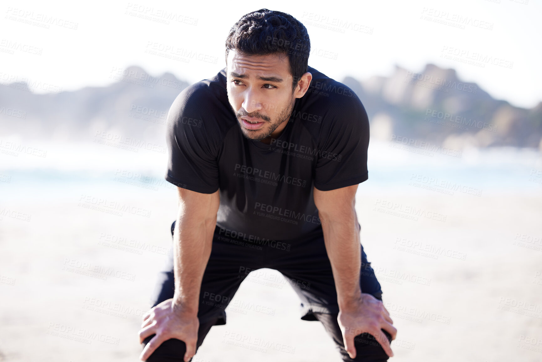 Buy stock photo Asian man, fitness and exhausted with break at beach for sports, exercise and training for body health. Male athlete, breathe and tired from workout with run fatigue, recovery and cardio in nature