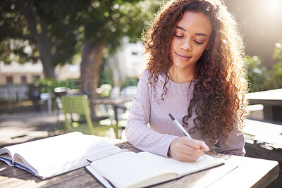 Buy stock photo Writing, studying and woman with books outdoor in park, cafe or university campus, notes or exam goals. Planning, ideas and african person or college student for remote work, scholarship and notebook