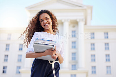 Buy stock photo University student, woman and books in portrait, outdoor and happy for research, studying and education at academy. Girl, person and smile with textbook, scholarship and learning at college campus