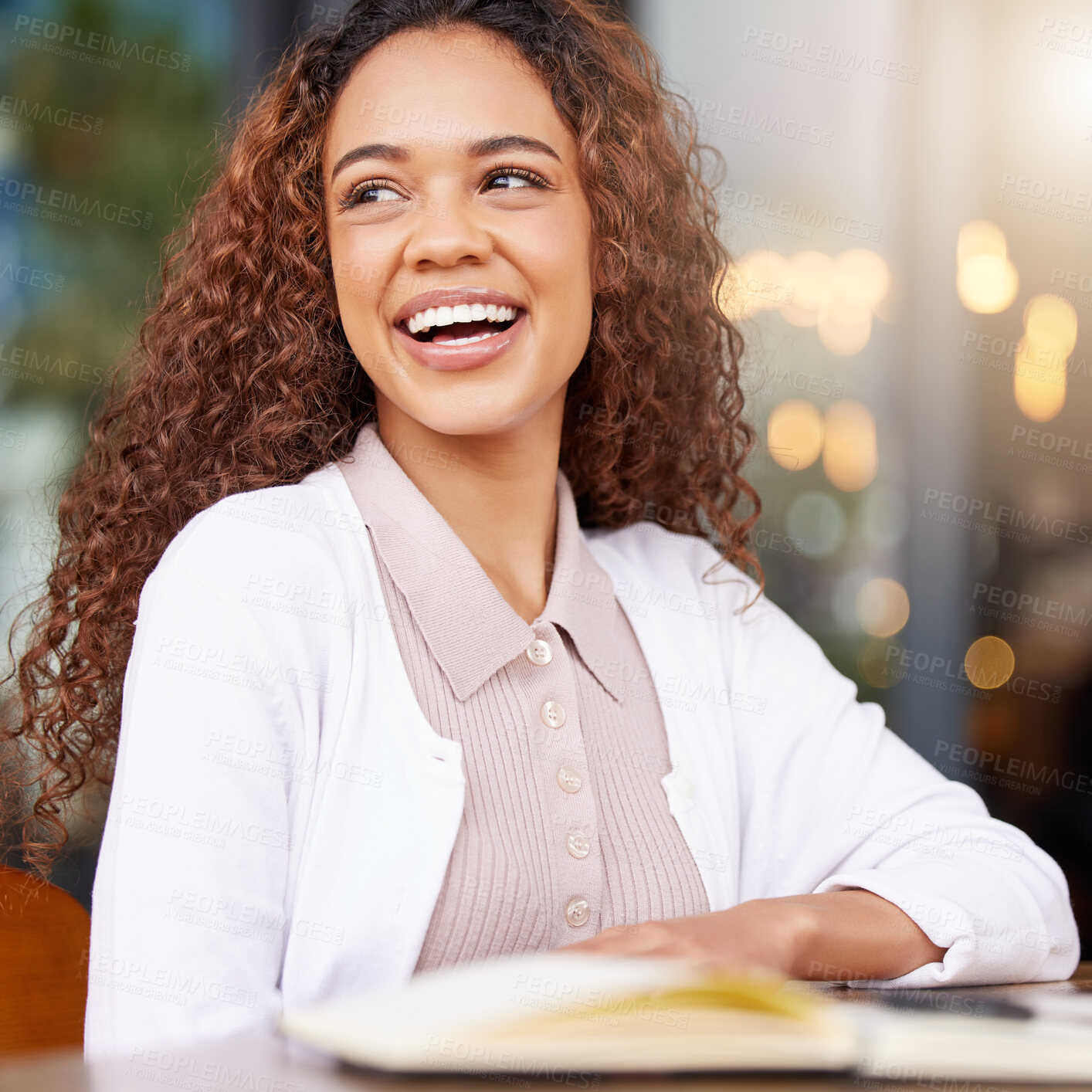 Buy stock photo Shot of a young businesswoman working at a cafe