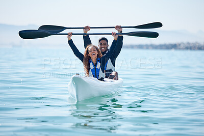 Buy stock photo Kayak, sports and team celebrate win on rowing boat on a lake, ocean or river for fitness challenge. Man and woman or winning couple with a paddle for adventure, teamwork exercise or travel on water