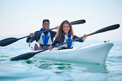 Buy stock photo Kayak, rowing and couple on a boat at ocean, lake or river for water sports or fitness challenge. Portrait of happy man and woman with a paddle for adventure, teamwork exercise or travel in nature