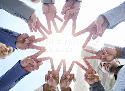 Buy stock photo Shot of a group of unrecognizable businesspeople making a star shape with their hands