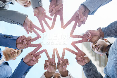 Buy stock photo .Shot of a group of unrecognizable businesspeople making a star shape with their hands