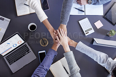 Buy stock photo Shot of a group of unrecognizable businesspeople stacking their hands at work